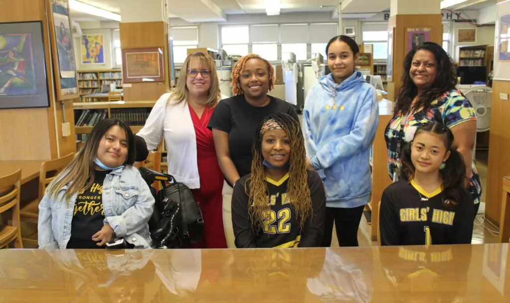 (Standing, left to right: Girls’ High Principal Lisa Mesi, student Amillyona, student Germayoni and school counselor Ms. Sheriff. Sitting, left to right: Student Belinda, student Sara and student Skyla.)